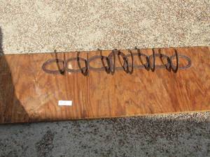 lot 32 image: 6 hook hand made horse shoe coat rack nailed on a wooden board