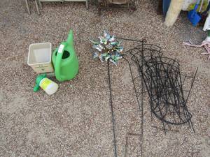 lot 34 image: flower water picture, hand seeder, miracle grow sprayer, yard dcor, plant fencing for flower garden