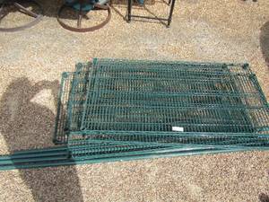 lot 37 image: 5 tier green metal shelf its disassembled but all pieces are available