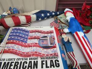 lot 14 image: 120 crystal lights American flag for yard dcor,     36 uncle sam plastic yard art and more