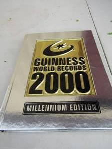 lot 24 image: Guinness world records book for 2000 Millennium edition