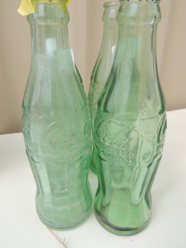 lot 239 image: Coca cola bottles COLLECTABLE