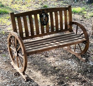 lot 35 image: Wagon Wheel Bench Seat W Decorative Cross And Inset Marine Challenge Coin