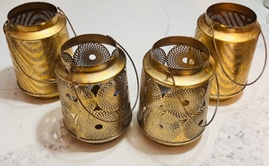lot 82 image: Four Brass Tea Light Lanterns