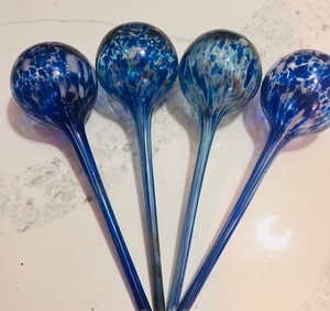 lot 93 image: Four Beautiful Hand Blown Glass Watering SpheresPotted Plant Feeders