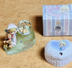 lot 115 image: 2000 Precious Moments Sliding Into The Season Snow Globe &amp 2003 Club Exclusive Theres Always A Place In My Heart For You Porcelain Covered Heart Shaped Box WOriginal Box