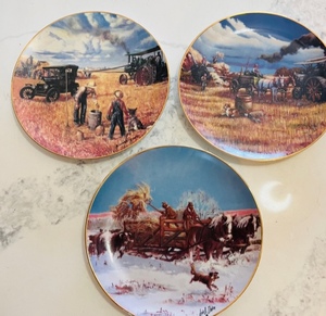 lot 129 image: 1993 Danbury Mint Winter Chores Collectible Plate of the American Farm Collection, 1990 Bountiful Harvest from Farming the Heartland, &amp 1992 Hard Days Work from The American Farm Collection