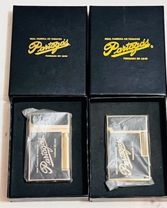 lot 141 image: Two New Black Partagas Flint Gas Lighters In Box