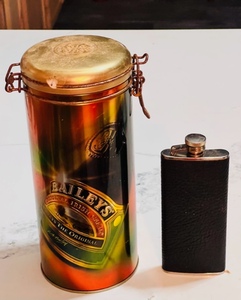 lot 153 image: Very Rare 1997 Baileys Irish Crme Collectible Metal Tin &amp 5oz Stainless Steel and Leather Wrapped Concorde Black Bison Flask