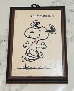 lot 158 image: Vintage 1971 Springbok Snoopy Keep Smiling Wooden Wall Plaque