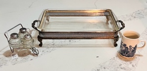 lot 203 image: Vintage 3 Qt. Pyrex 233 Glass Ovenware Casserole Dish W Vintage Silver Plate Casserole Holder, Chrystal Salt &amp Pepper ShakerWith Sugar and Spoon Set in Metal Wheelbarrow, &amp Churchill England Blue Willow 4CoffeeTea Cup