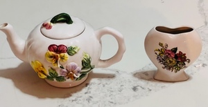 lot 367 image: Vintage Holland Floral White TeapotWith Sculpted Raised Flowers WHook Lid & Vintage Porcelain Floral Pattern Heart Shaped Bud Vase