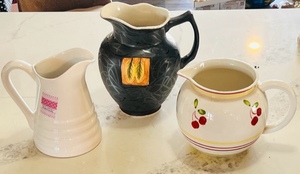 lot 377 image: Three Vintage Pitchers - Including White Farval Pitcher Made in Portugal & 1997 Clay Art Hand Painted Sonoma Cherries Pitchers
