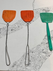 lot 414 image: Three Vintage Fly Swatters