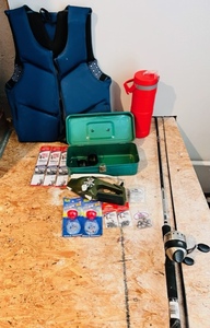 lot 62 image: Great Fishing Lot  Includes New Zebco 33, Ronco Pocket Fisherman, &amp Fishing Tackle