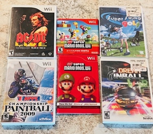lot 125 image: Five Nintendo Wii Games - Including Super Mario Bros. Wii