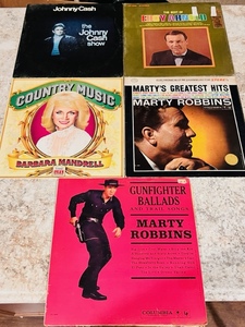 lot 142 image: Five Vintage Country Record Albums- Johnny Cash, Eddy Arnold, Marty Robbins, &amp Barbara Mandrell