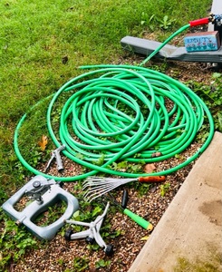 lot 149 image: Extreme Length Water Hose, Two Sprinklers, Spray Nozzle, &amp Yard Tools