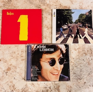 lot 155 image: Three Beatles CDs - The Beatles 1&nbspAbbey RoadJohn Lennon