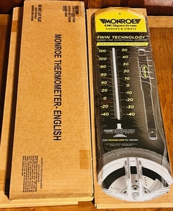 lot 164 image: Three New Monroe DESpectum Shocks &amp Struts Metal Wall Hanging Thermometers