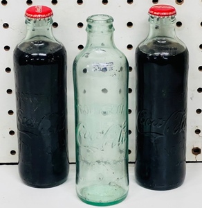 lot 181 image: Three Vintage Coca-Cola Bottles - Two Unopened&nbsp
