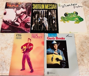 lot 198 image: Five Hal Leonard Guitar Recorded Versions With Notes and Tabs, Authentic Record Transcripts, Along With Other Brands - Including Tesla, Elvis, &amp Garth Brooks