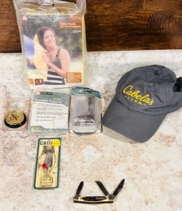 lot 219 image: Outdoorsman Lot - Including Schrade Uncle Henry Knife &amp Grizzley Fishing Lure