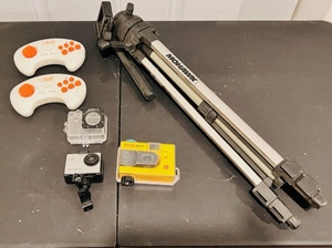 lot 233 image: Mohawk Camera TripodKodak Underwater CameraEmerson Go-Pro Type Camera Blast Game Controllers