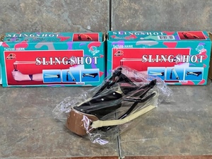 lot 30 image: Two (2) New Kentucky Tactical Supplies TA2500Haek Slingshots - 2x Money