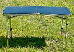 lot 43 image: Portable Folding Camp Table With Adjustable Height Legs