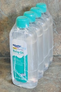 lot 57 image: Four Pack of Equate Hypoallergenic Baby Oil W Aloe Vera &amp Vitamin E