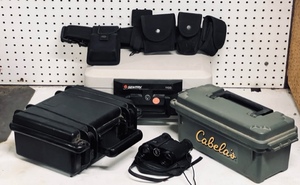 lot 101 image: Cabelas Ammo Box,Black Utility Belt, Sentry 1100 Fireproof Safe, Pistol Case, &amp Focal Field Glasses 20-20-16 3.5 x 30