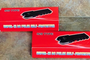 lot 121 image: Two (2) 928 Type Super-Hi DC pulled Self-Protector Stun Guns - 2x Money