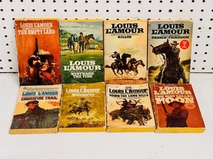 lot 133 image: Lot of Eight (8) 1956-1985 Louis Lamour Paperbacks