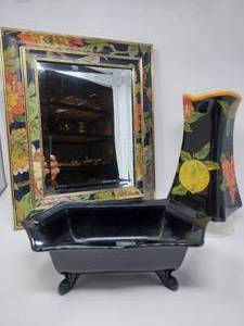 lot 17 image: Decor lot Includes Black Floral Printed Wall Mirror, Decor Pitcher Vase and Black Footed CandySoap dish.