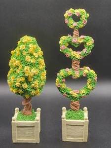 lot 58 image: Dept 56 Lot, Includes This listing is for a Department 56 Heart Shaped Topiary Flowering Tree with Yellow and Pink Roses. stands 9, Floral Tree Topiary 7inches tall.