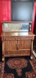lot 150 image: Antique Empire Server w Mirror Hutch. Veneer Ships in some places, see pictures 50W x 22D x 54H.