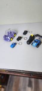 lot 248 image: VW Bank, 3 Key Chains, and Remote-Control Car