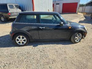 lot 1 image: 2009 Mini Cooper - runs and drives - Engine light is on - Vin#WMWMF33549TT68781 - Come and Preview - NO TITLE - Buyer will need to apply for lost or Bonded title. - SOLD AS IS