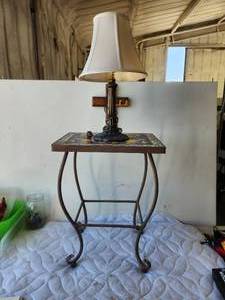 lot 8 image: Metal table with tile top and metal lamp