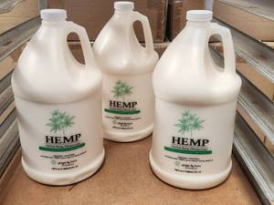 lot 72 image: Selection of 3 - 1-gallon bottles of Hemp herbal body moisturizer