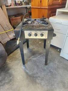 lot 221 image: Big sixty utility Stove - propane