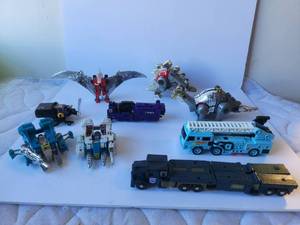 lot 104 image: Selection of vintage transformers toys