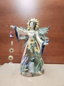 lot 126 image: Clayworks - Blue Sky candle holder figure