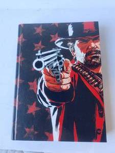 lot 135 image: Red Dead Redemption 2 gaming hardcover book
