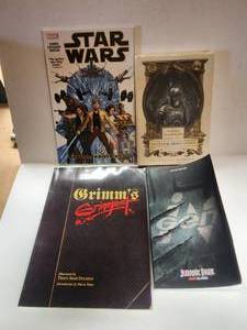 lot 179 image: Selection of Star Wars, Jurassic Park, Grimms books