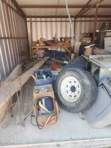 lot 245 image: Everything in storage unit pictured - to the left of metal wall frame brown supports (stacked bins not included)