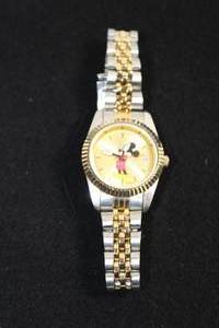 lot 52 image: Disney eWatch Factory Mickey Mouse watch. Model P-234-2657-4 17040 Gold flex band
