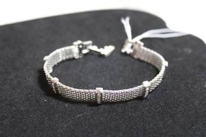 lot 2 image: Swarovski crystal station bracelet. Marked Swarovski. Fold over clasp. 7L