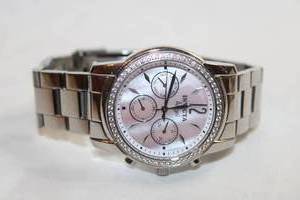 lot 59 image: Invicta ANGEL Watch Model Flame Fusion Crystal. Pearlized Rose face. Swiss made w logo branded polishing cloth